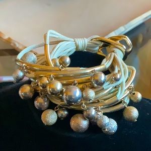 bracelet with beads of silver & gold color, some with coating that sparkles